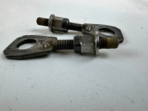 2006 HONDA CR85R OEM Chain Axle Tensioners Set 03-07