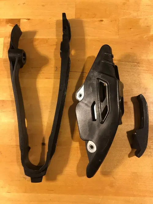 OEM 2023 23 KTM 300 SX XC 300SX REAR SWINGARM CHAIN SLIDER GUIDE SPROCKET COVER