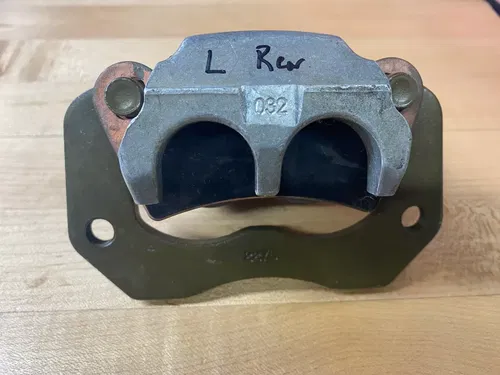 OEM POLARIS RZR 900 1000 LEFT LH REAR BRAKE CALIPER BRACKET PADS 1912274 15-21