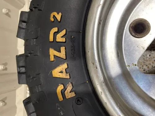 FRONT OEM SUZUKI WHEELS & MAXXIS RAZR 21X7X10 TIRES HONDA TRX450R TRX250R LTR450