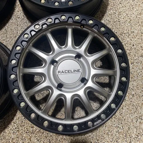 Raceline Alpha Beadlock 17" Wheels Silver (+25mm) Can-Am Maverick X3 Wheel Set