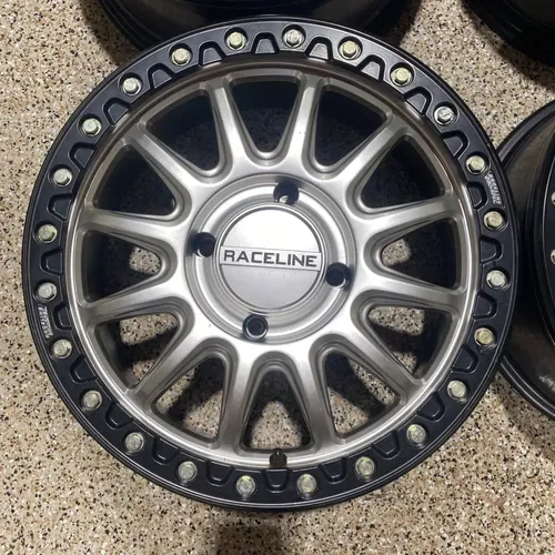 Raceline Alpha Beadlock 17" Wheels Silver (+25mm) Can-Am Maverick X3 Wheel Set