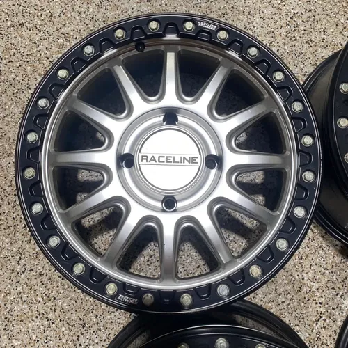Raceline Alpha Beadlock 17" Wheels Silver (+25mm) Can-Am Maverick X3 Wheel Set