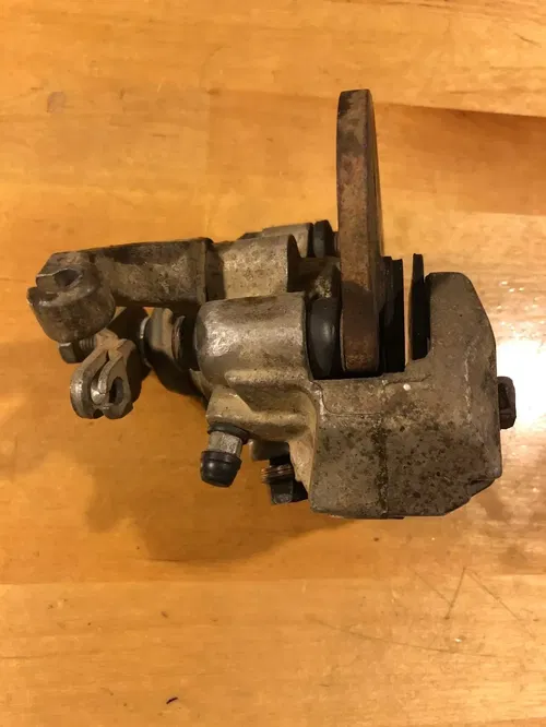 OEM 05-14 HONDA TRX 400EX 400X TRX400EX TRX400 REAR BRAKE CALIPER BACK MOUNT