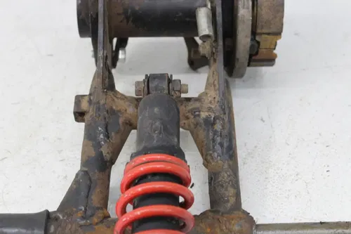 01 POLARIS SCRAMBLER 90 REAR AXLE BACK WHEEL PIVOT BOLT SHAFT W/ HUB & SHOCK