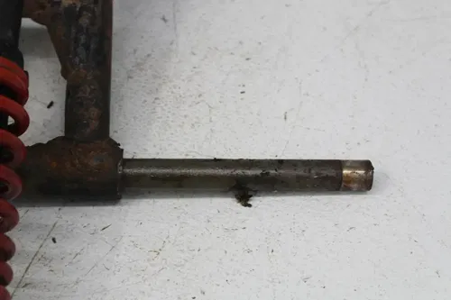 01 POLARIS SCRAMBLER 90 REAR AXLE BACK WHEEL PIVOT BOLT SHAFT W/ HUB & SHOCK
