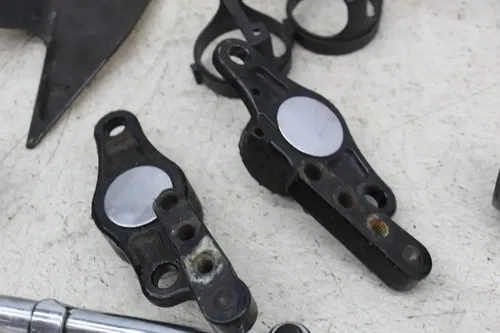 07-11 HARLEY-DAVIDSON STREET GLIDE FLHX PARTS HARDWARE TRIM AXLE LEVER MOUNTS