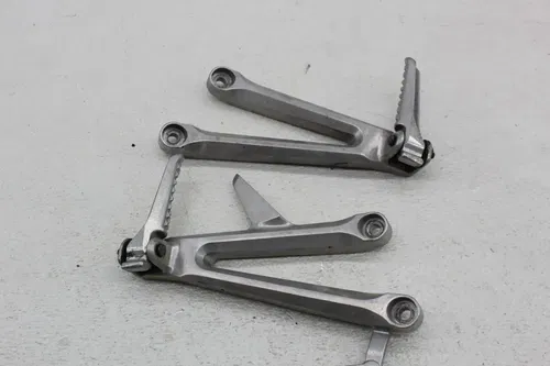 06-07 HONDA CBR1000RR RIGHT LEFT REAR BACK PASSENGER FOOT STEP PEGS