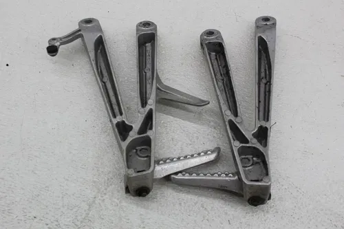 06-07 HONDA CBR1000RR RIGHT LEFT REAR BACK PASSENGER FOOT STEP PEGS