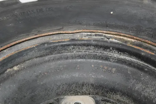 02 POLARIS SPORTSMAN 400 RIGHT REAR BACK WHEEL RIM (SEE DESCP)
