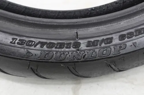 DUNLOP AMERICAN ELITE 130/70 B18 M/C 63H FRONT TIRE (TREAD:5/32NDS)