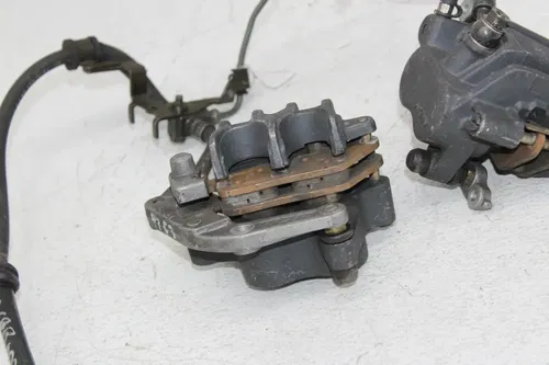 1997 HONDA CBR600F3 RIGHT LEFT FRONT BRAKE CALIPER SET PAIR CALIPERS