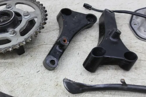 12-25 KAWASAKI NINJA ZX14R PARTS HARDWARE LEFT CLIPON AXLE SPROCKET REAR PEG