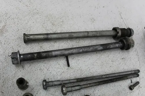 05-06 KAWASAKI NINJA ZX10R PARTS AND HARDWARE NUTS BOLTS SPROCKET AXLE PEG