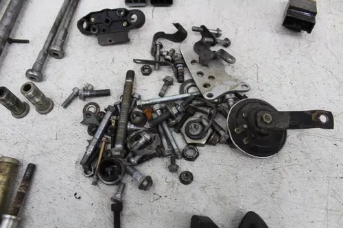 05-06 KAWASAKI NINJA ZX10R PARTS AND HARDWARE NUTS BOLTS SPROCKET AXLE PEG