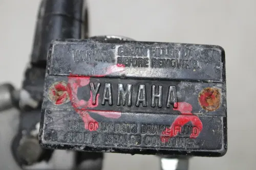87 YAMAHA WARRIOR 350 FRONT BRAKE MASTER CYLINDER LEVER W/ THUMB THROTTLE (READ)
