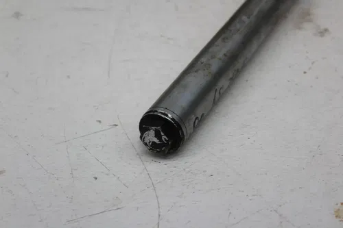 80 SUZUKI GS750E LEFT FRONT FORK SHOCK SUSPENSION