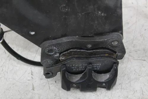 06 TRIUMPH SPEEDMASTER REAR BACK BRAKE CALIPER W MOUNT BRACKET