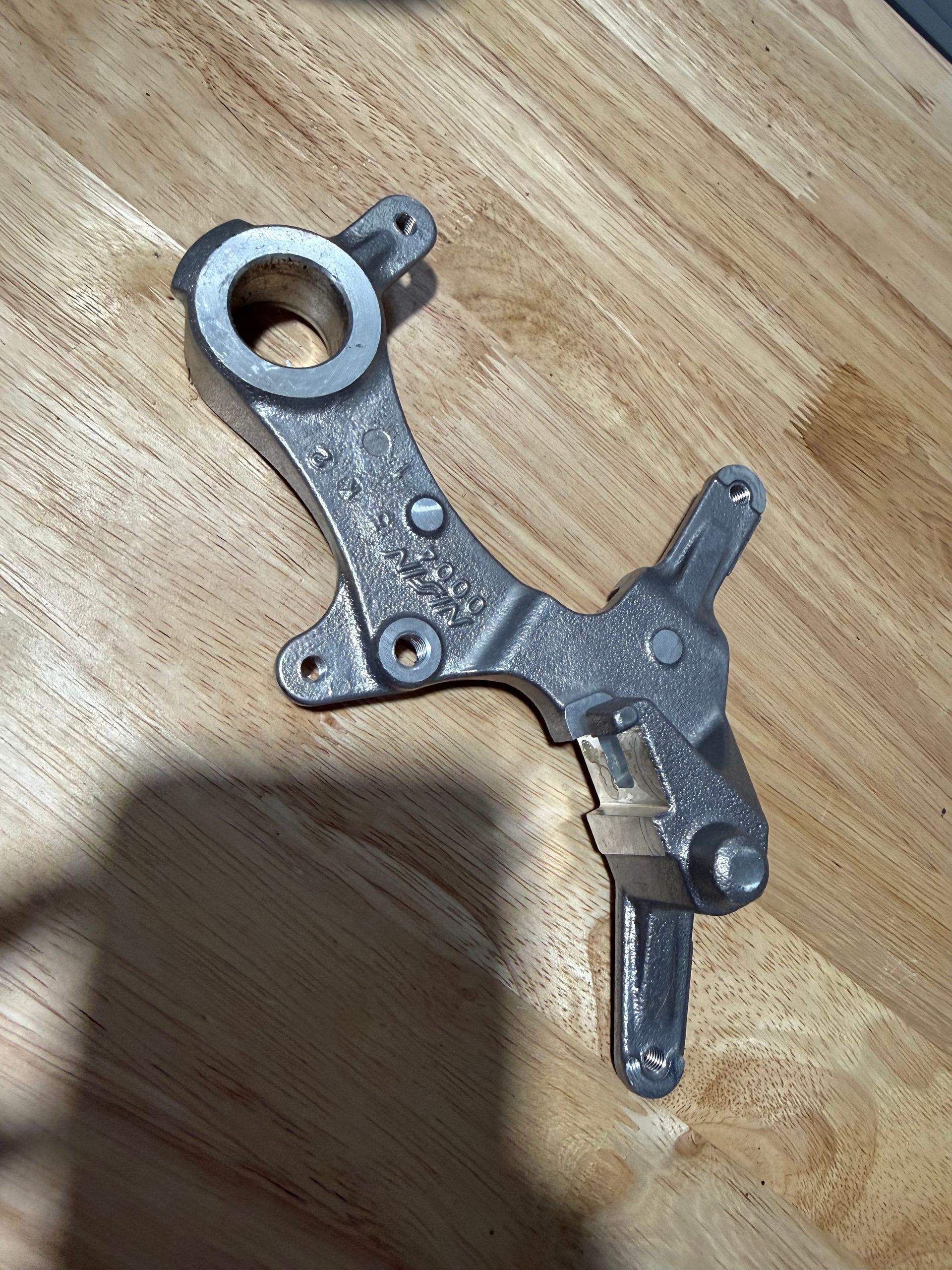 Rear Caliper Bracket - OEM Kawasaki 14079-0619 Kx250 Kx450 