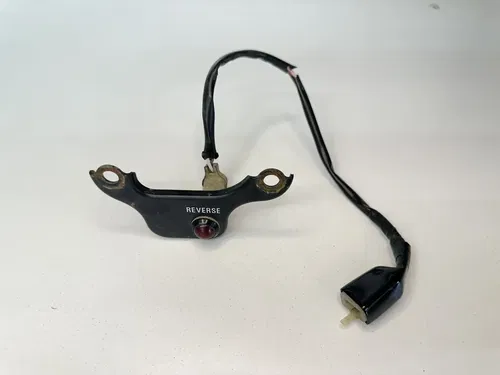 USED OEM 90-04 KAWASAKI 250 MOJAVE REVERSE LIGHT & MOUNTING BRACKET ASSY
