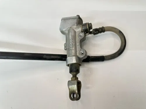 OEM 06 07 08 KAWASAKI KX450F REAR BRAKE CALIPER & MOUNT W MASTER CYLINDER & LINE