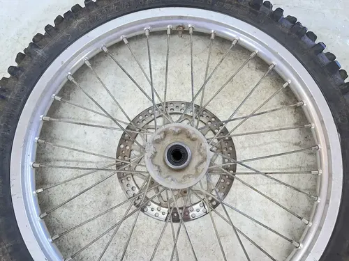 #2 USED OEM 92-95 YAMAHA YZ 250 / 92-97 WR250 FRONT 21" WHEEL RIM & HUB ASSY