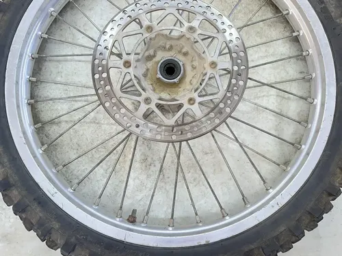 #2 USED OEM 92-95 YAMAHA YZ 250 / 92-97 WR250 FRONT 21" WHEEL RIM & HUB ASSY
