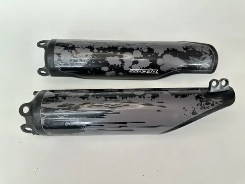 USED 04-16 HONDA CRF250R CRF450R BLACK LOWER FORK GUARDS SET