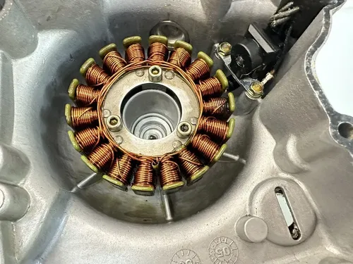 USED OEM 06-07 POLARIS 200 SAWTOOTH / 05-14 PHOENIX STATOR & RIGHT ENGINE COVER