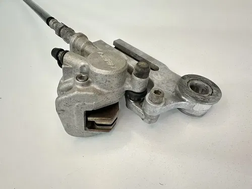 USED OEM 90 1990 YAMAHA YZ125 YZ250 YZ 125 250 REAR BRAKE CALIPER & MOUNT ASSY