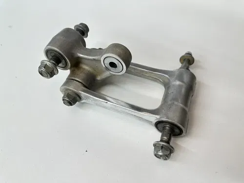 USED OEM 09 2009 KAWASAKI KX250F REAR SHOCK SWINGARM LINK LINKAGE DOG BONE ASSY