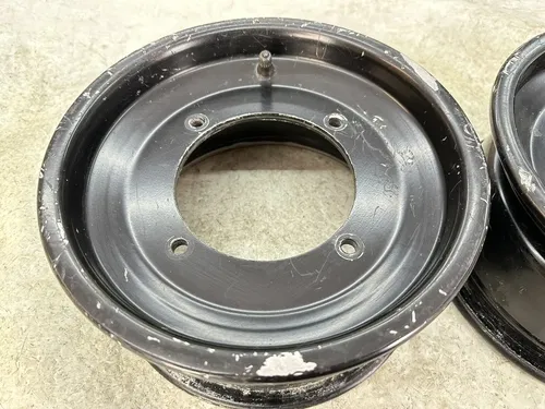 USED OEM 07-11 POLARIS OUTLAW 525 IRS S 450 MXR STOCK BLACK FRONT WHEEL RIM SET