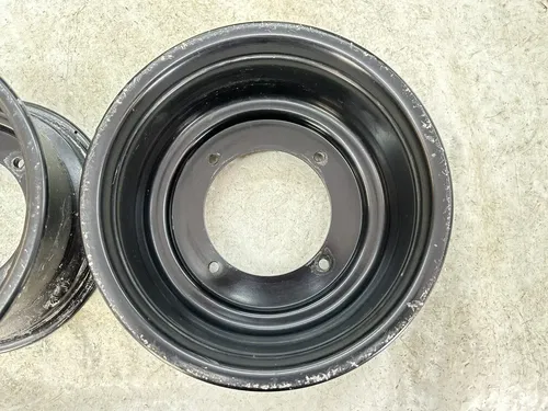 USED OEM 07-11 POLARIS OUTLAW 525 IRS S 450 MXR STOCK BLACK FRONT WHEEL RIM SET
