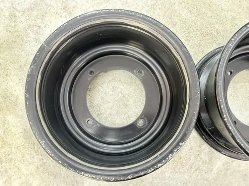 USED OEM 07-11 POLARIS OUTLAW 525 IRS S 450 MXR STOCK BLACK FRONT WHEEL RIM SET