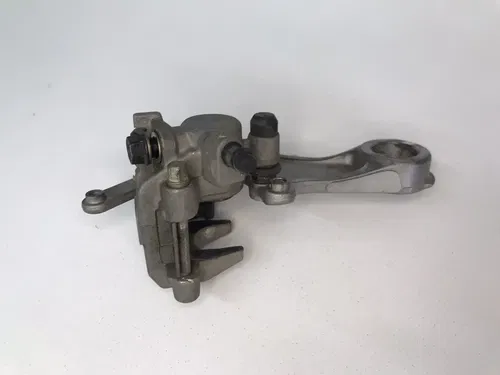 USED OEM 05-16 HONDA CRF250R CRF450R COMPLETE REAR BRAKE CALIPER & MOUNT ASSY