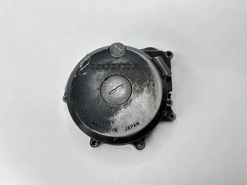 1985 85 HONDA XR250R XR 250 200 XR200R LEFT SIDE ENGINE STATOR FLYWHEEL COVER