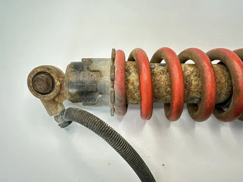 OEM 88-93 SUZUKI LT230E LT 230 QUADRUNNER ORANGE REAR SHOCK ABSORBER SUSPENSION