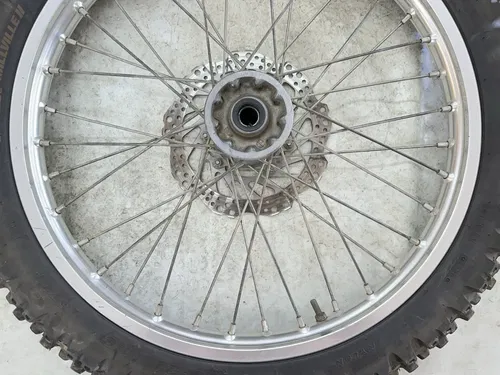 USED OEM 04-12 HONDA CRF250R CRF450R FRONT WHEEL RIM & ROTOR ASSY 21X1.60