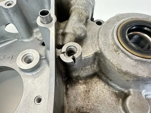 USED OEM 2004 04 KAWASAKI KX250F LEFT SIDE ENGINE MOTOR CASE CRANKCASE