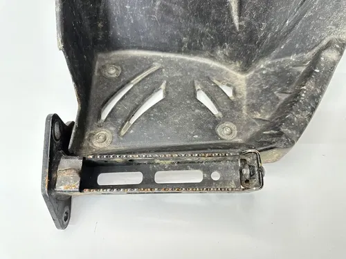 USED OEM 07 08 OUTLAW 525 S IRS LEFT SIDE HEEL GUARD & PEG W SUPPORT BRACKETS