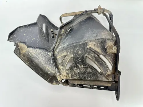 USED OEM 07 08 OUTLAW 525 S IRS LEFT SIDE HEEL GUARD & PEG W SUPPORT BRACKETS