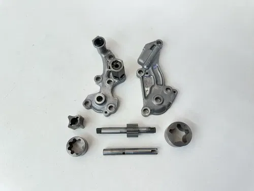 USED OEM 09-15 KAWASAKI KX450F OIL PUMP COVERS & ROTORS ASSEMBLY