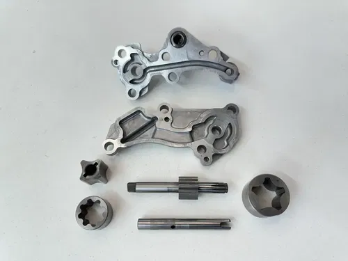 USED OEM 09-15 KAWASAKI KX450F OIL PUMP COVERS & ROTORS ASSEMBLY