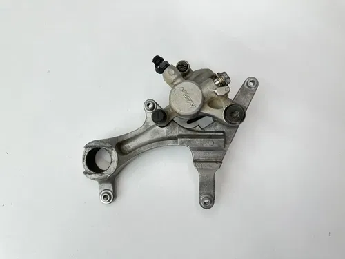 USED OEM 2004 04 2005 05 KAWASAKI KX250F REAR BRAKE CALIPER & MOUNT ASSY