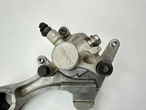 USED OEM 2004 04 2005 05 KAWASAKI KX250F REAR BRAKE CALIPER & MOUNT ASSY