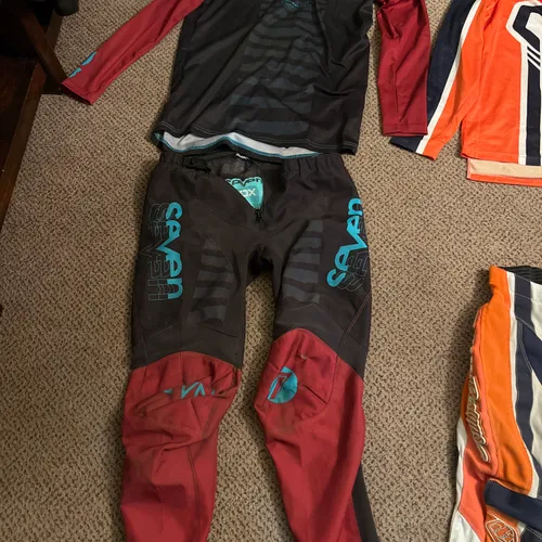 Set Of "seven" Gear, Maroon, Black, And Teal. 