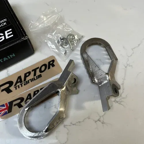 Raptor Titanium Edge Custom Kawasaki lowered foot pegs 10mm down 5mm back
