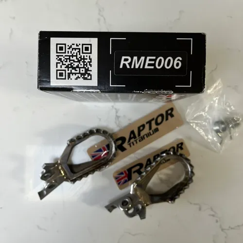 Raptor Titanium Edge Custom Kawasaki lowered foot pegs 10mm down 5mm back