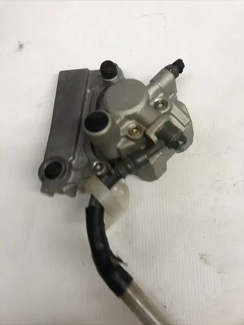 2006 KAWASAKI KX100 OEM REAR BACK BRAKE CALIPER MASTER CYLINDER ASSEMBLY