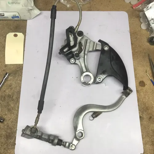 2009 KAWASAKI 06-09 KX250F STAINLESS REAR BACK BRAKE CALIPER MASTER LEVER LINE
